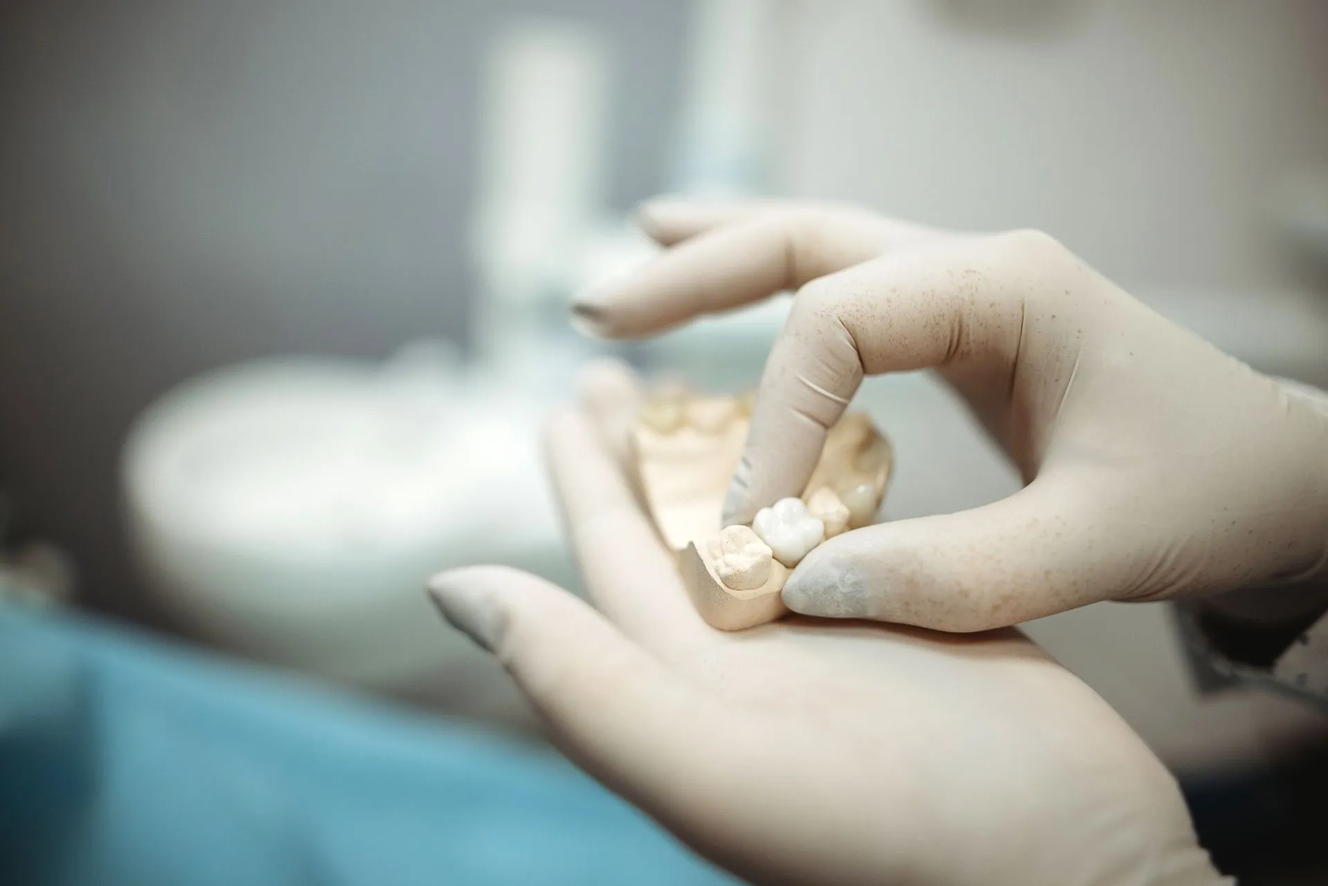 A crown being fitted on a dental model