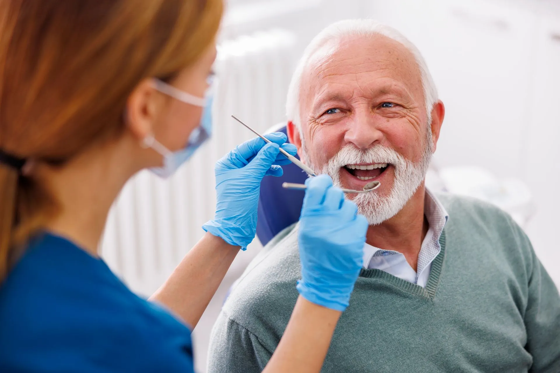 A senior patient at a dental appointment